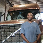 Haywood in front of truck