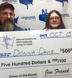 Driver Manager Phil Eade presents check to Donna Davis