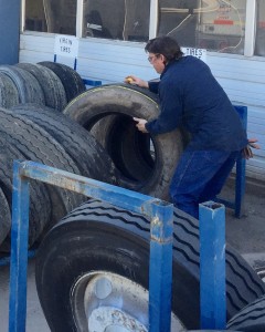 Jason Leister moving tires